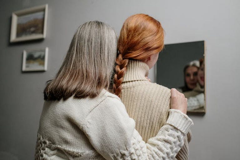 grandmother hugging child