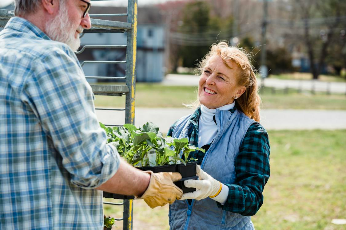 gardeners with vegetables