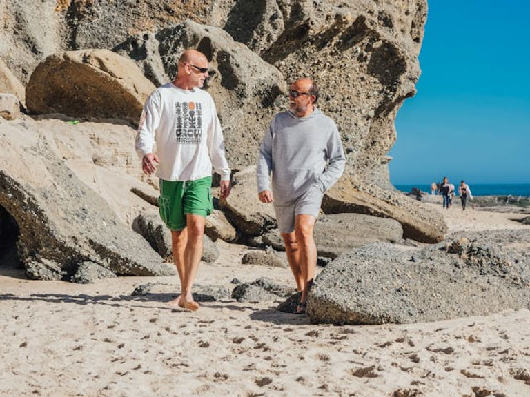 gay seniors on beach